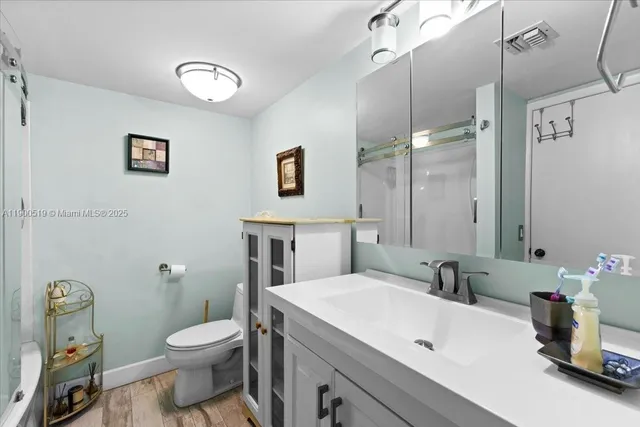 an aerial view of a house with outdoor space