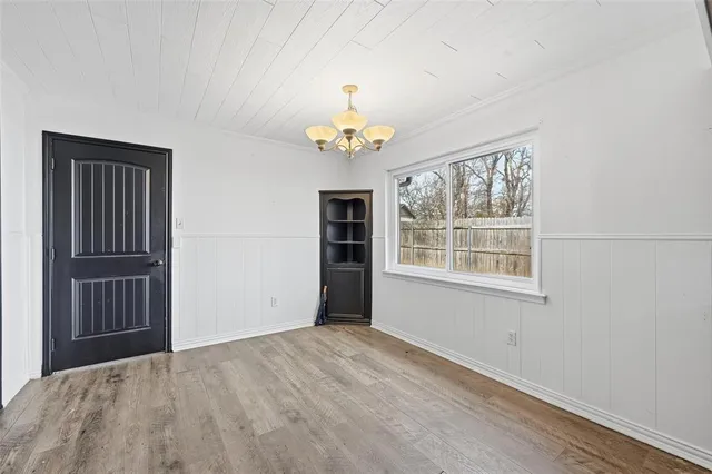 a view of a big room with closet and ceiling fan