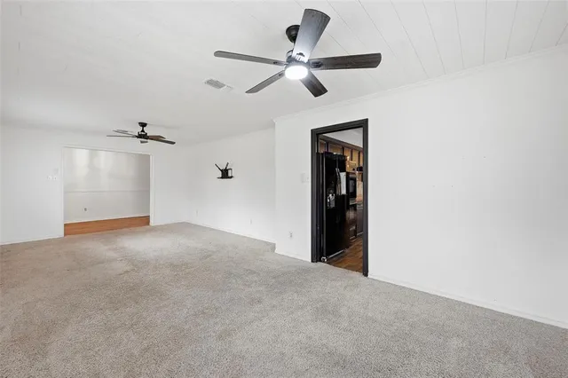 a view of empty room with windows