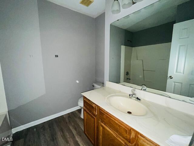 5419 Gunnette Drive Raleigh, NC 27610 - Photo 8 of 14 a bathroom with a sink and a mirror