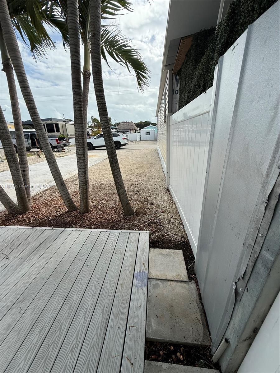 325 Calusa Street Key Largo, FL 33037 - Photo 9 of 25 a view of wooden floor
