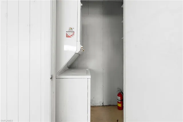 a view of hallway with washer and dryer