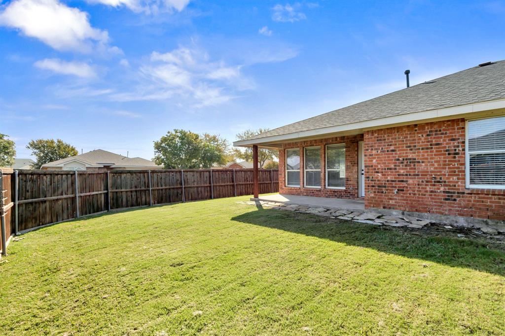 4172 Freedom Lane Frisco, TX 75033 - Photo 26 of 28 a swimming pool with outdoor seating and yard