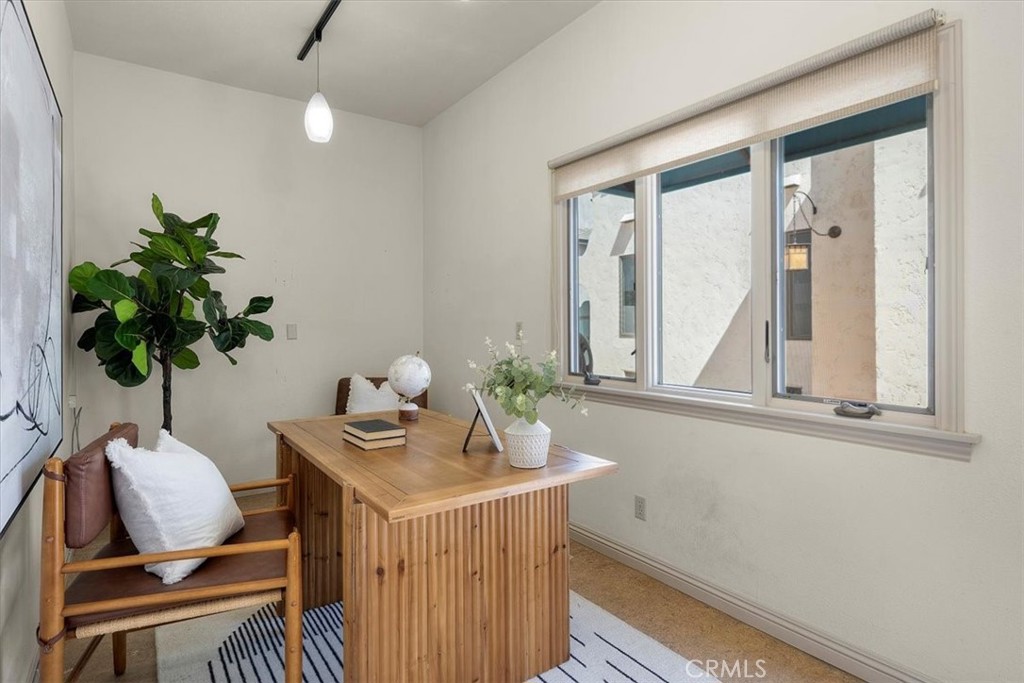 243 Park Avenue Long Beach, CA 90803 - Photo 21 of 52 a view of a workspace with furniture