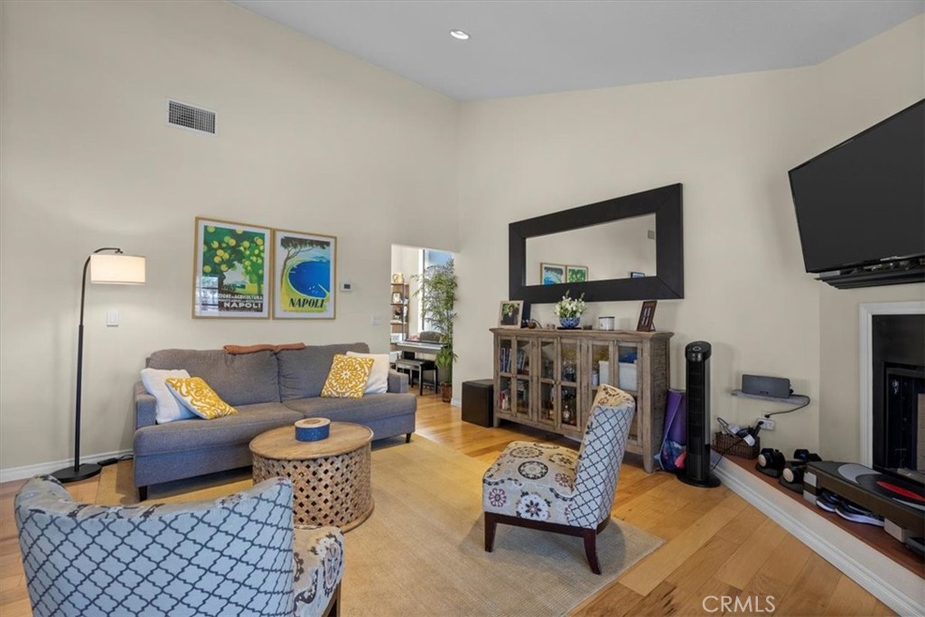 243 Park Avenue Long Beach, CA 90803 - Photo 29 of 52 a living room with furniture and a flat screen tv