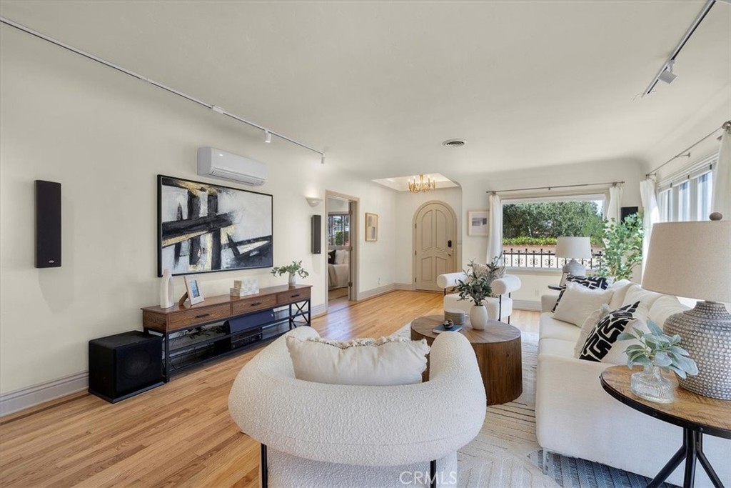 243 Park Avenue Long Beach, CA 90803 - Photo 3 of 52 a living room with furniture and a wooden floor