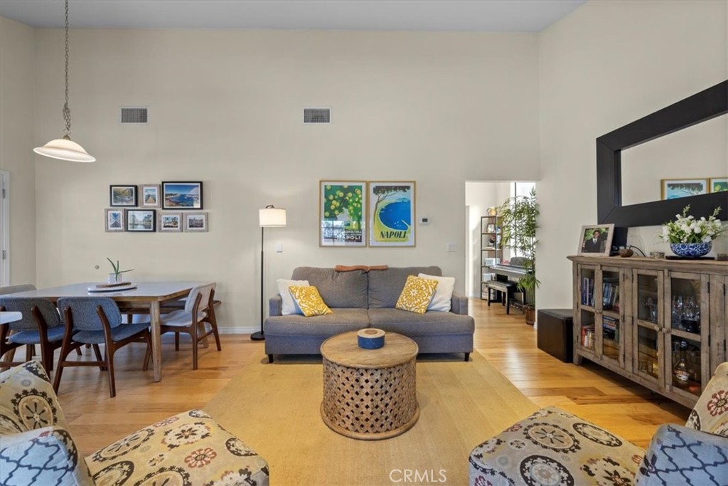 243 Park Avenue Long Beach, CA 90803 - Photo 31 of 52 a living room with furniture and a rug