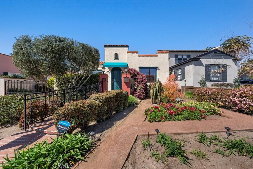 243 Park Avenue Long Beach, CA 90803 - Photo 46 of 52 a front view of a house with a yard