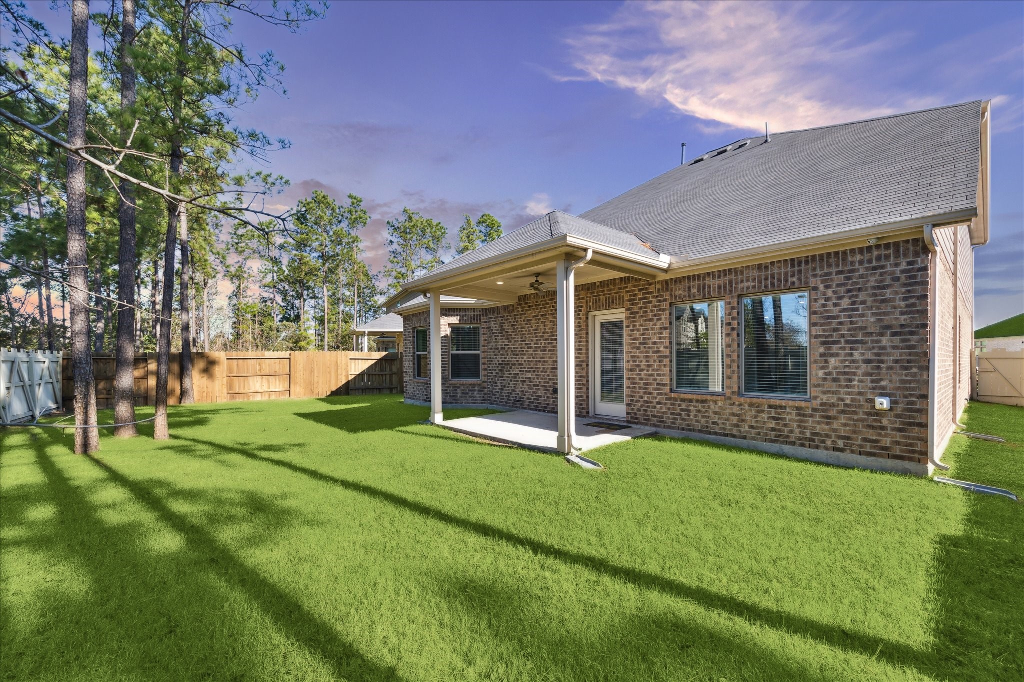 17108 Coneflower Place Conroe, TX 77385 - Photo 15 of 27 Your private backyard oasis with a covered patio.