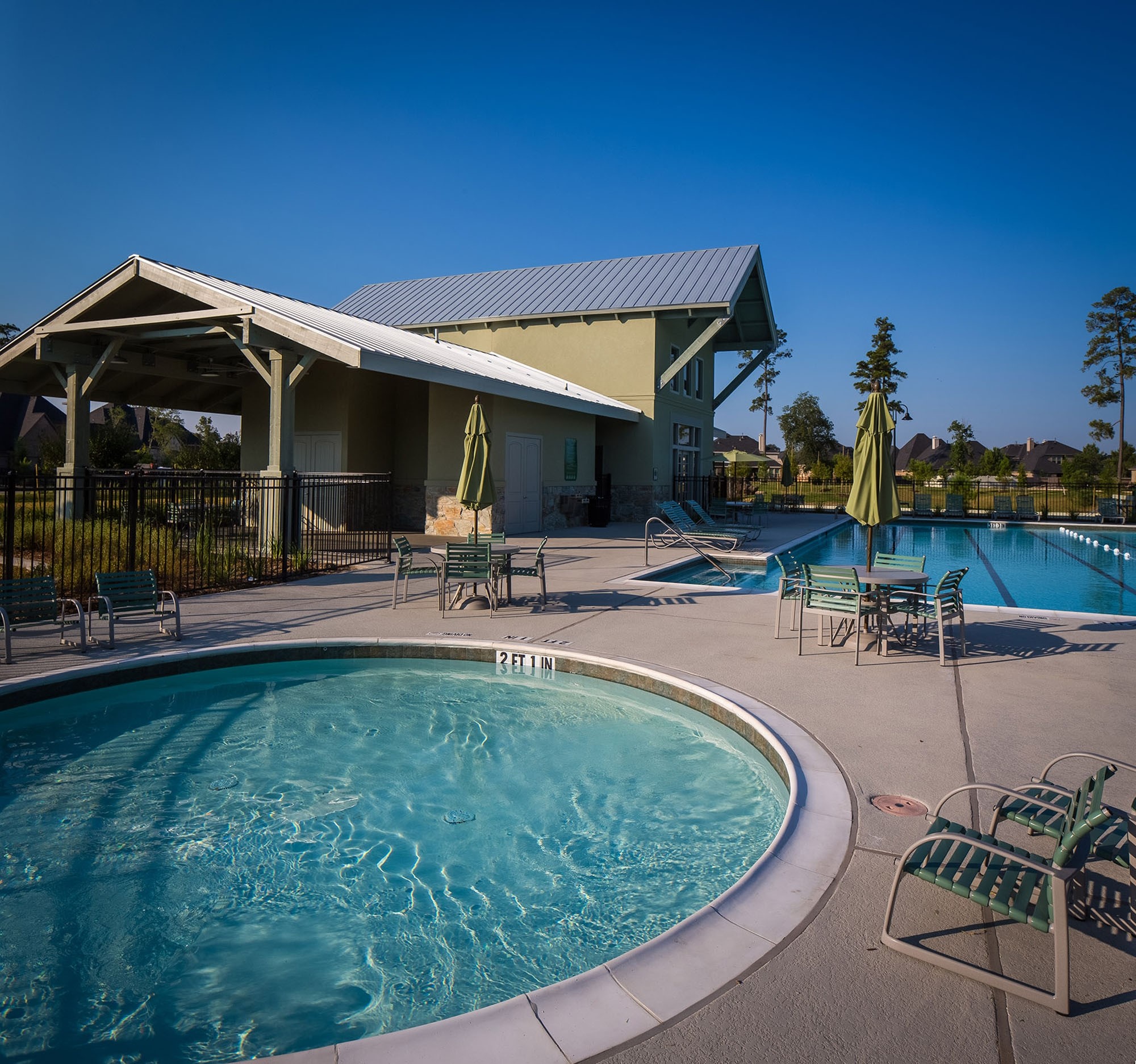 17108 Coneflower Place Conroe, TX 77385 - Photo 22 of 27 Different pools at the clubhouse for either recreational or exercise swimming.