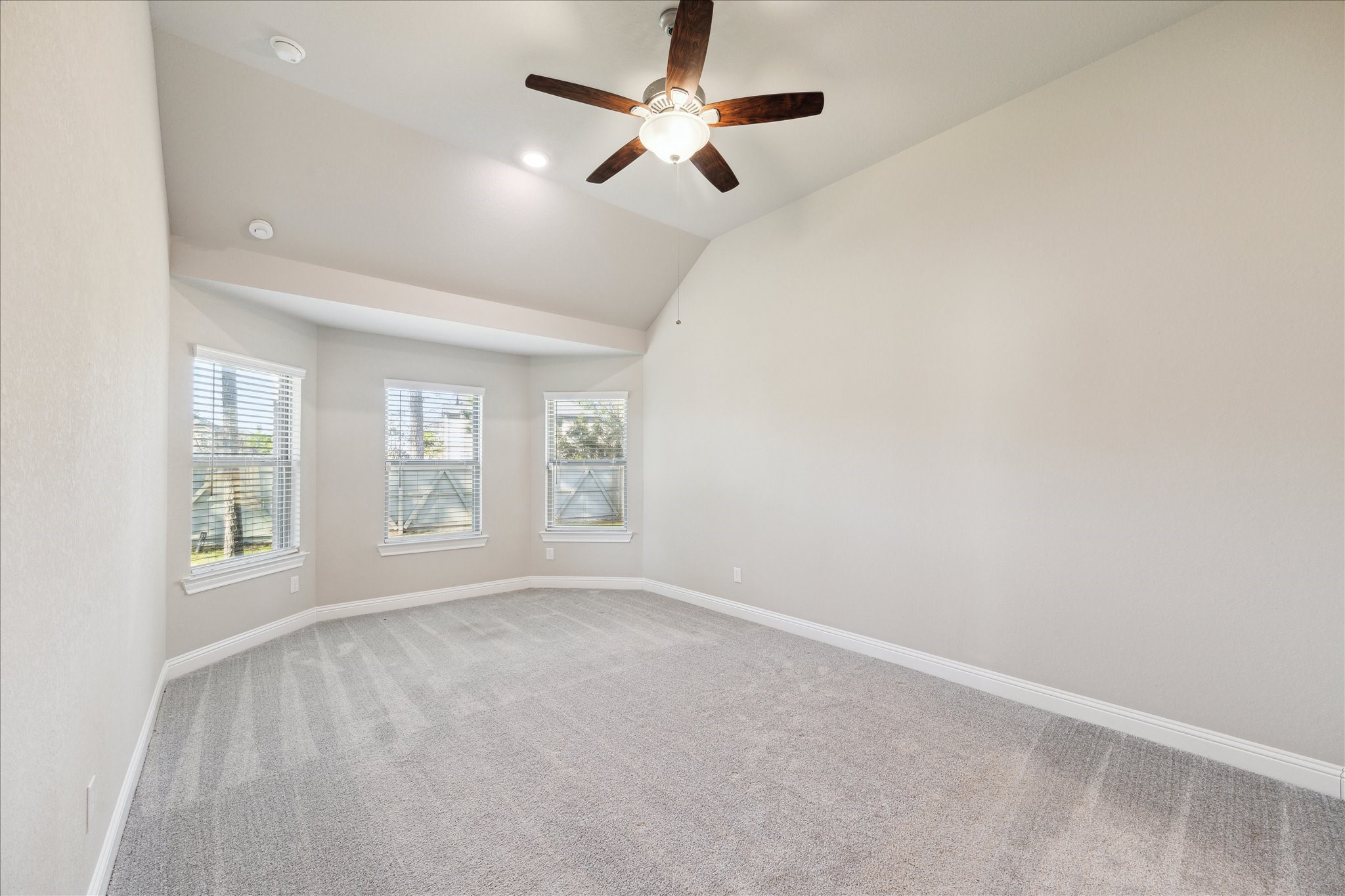 17108 Coneflower Place Conroe, TX 77385 - Photo 5 of 27 Entering the primary bedroom with views to the backyard.
