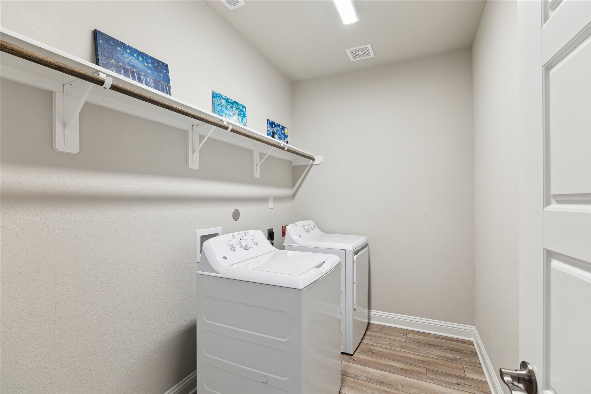 17108 Coneflower Place Conroe, TX 77385 - Photo 9 of 27 Large Laundry room, which includes washer and dryer.