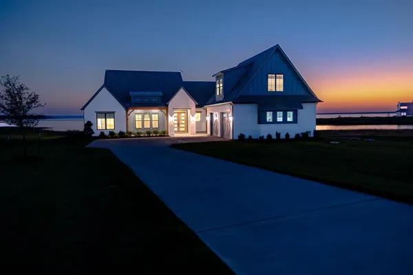 a living room with furniture fireplace and flat screen tv