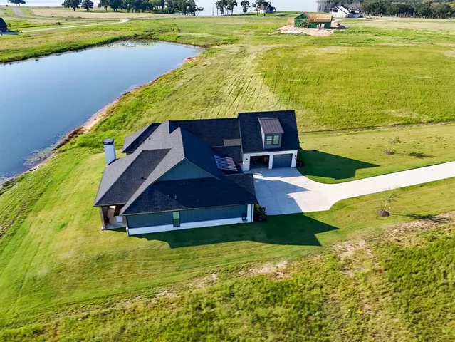a view of a swimming pool with an ocean view