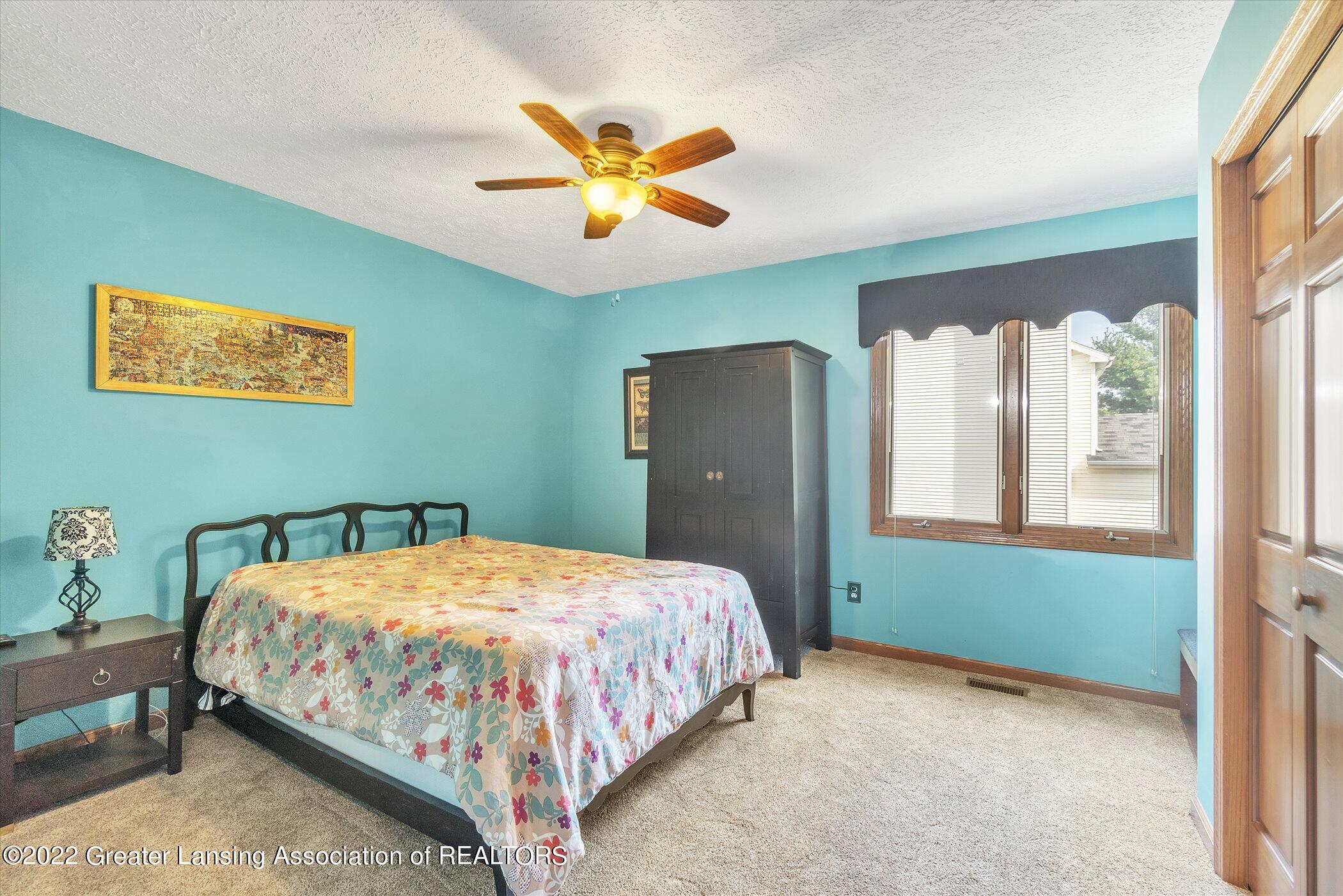 11921 Schavey Road Dewitt, MI 48820 - Photo 27 of 46 27. Bedroom 4