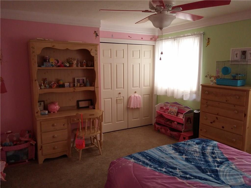 390 Richard Road Wexford, PA 15090 - Photo 13 of 21 2nd bedroom has a ceiling fan, wall-wall carpeting and a closet with organizers