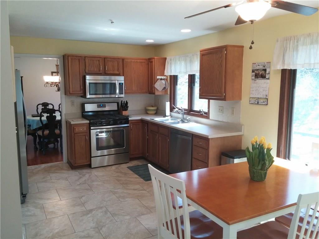 390 Richard Road Wexford, PA 15090 - Photo 3 of 21 Newer kitchen flooring, paint, hardware, counter top and stainless appliances
