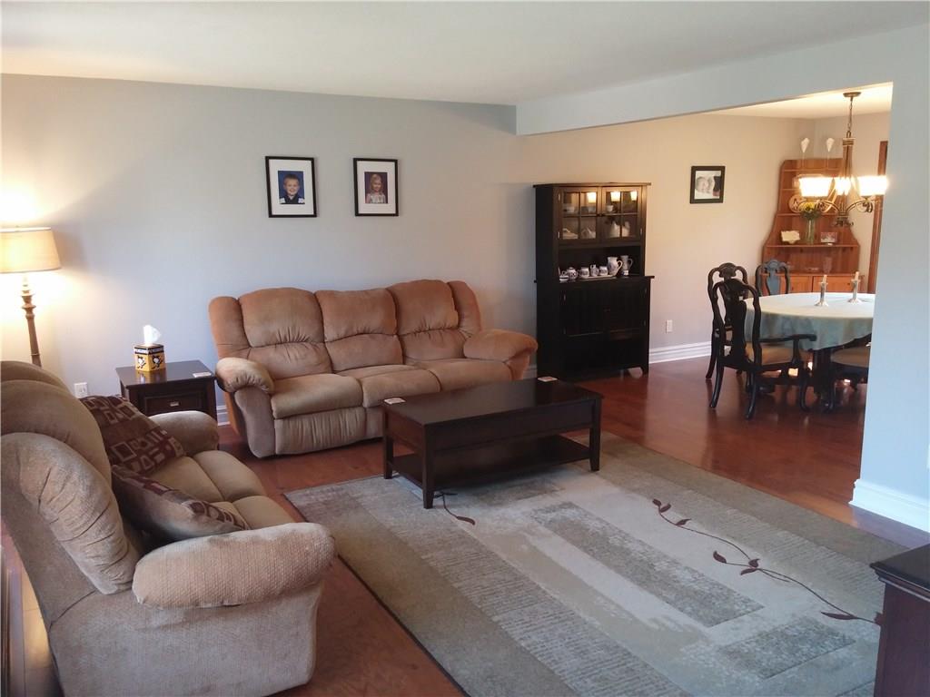 390 Richard Road Wexford, PA 15090 - Photo 7 of 21 Spacious living room with newer hardwood flooring