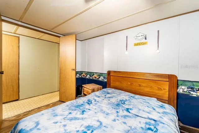 a bathroom with a sink a toilet and shower curtain