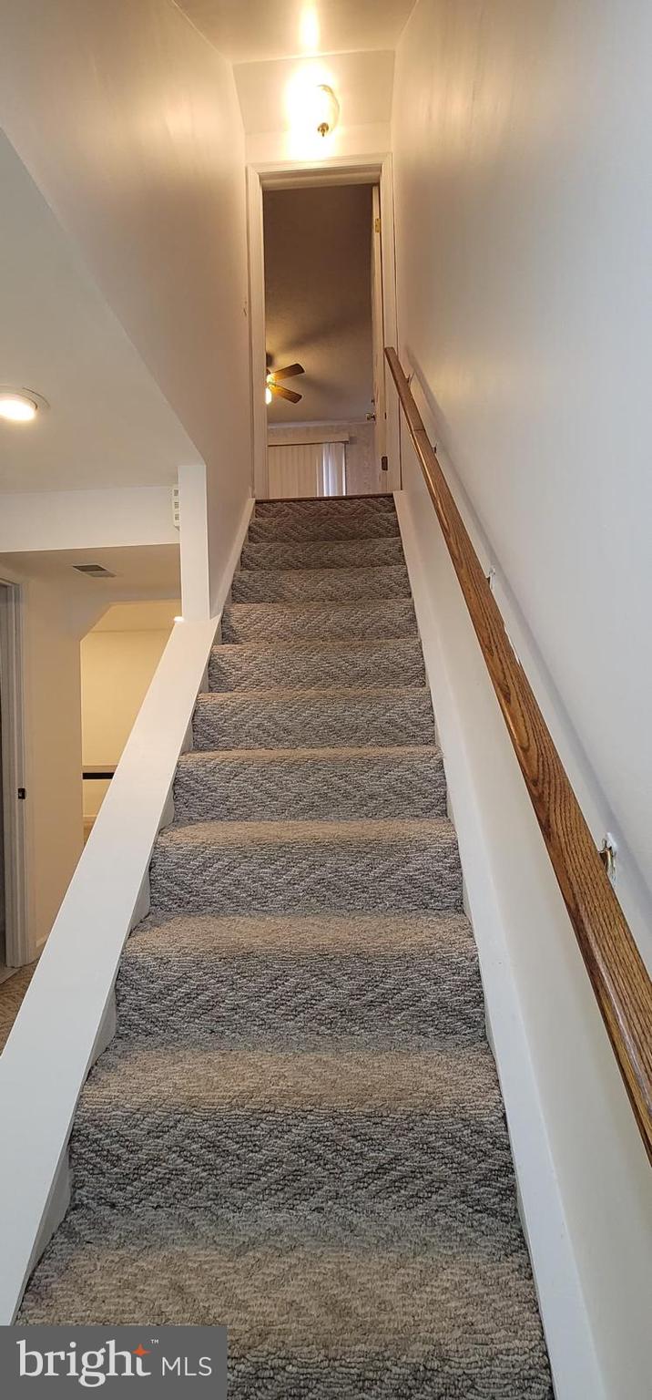 11038 Outpost Drive North Potomac, MD 20878 - Photo 21 of 39 basement stairs to living room