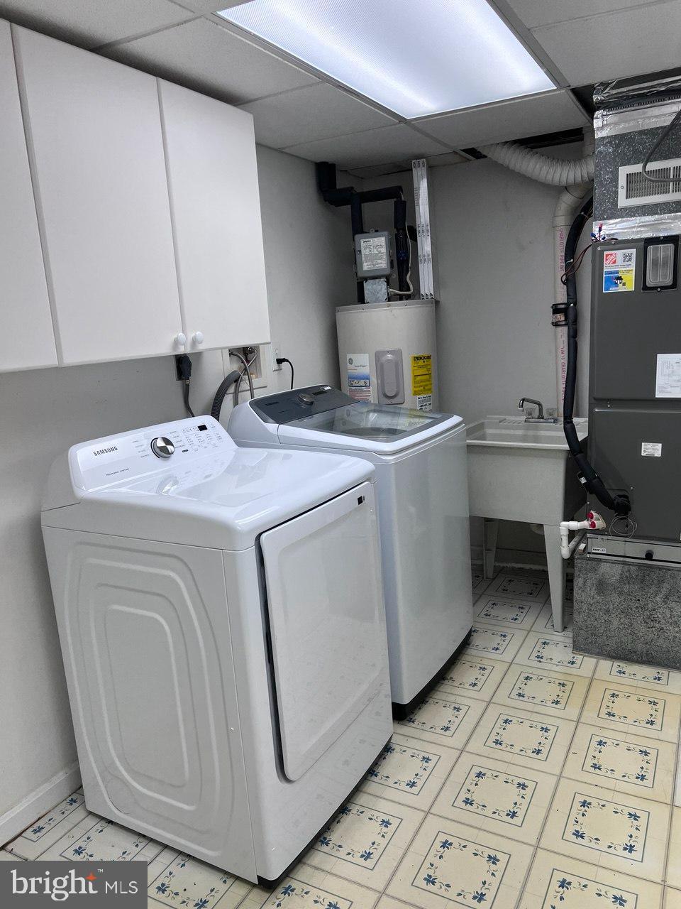 11038 Outpost Drive North Potomac, MD 20878 - Photo 23 of 39 basement storage and washer dryer