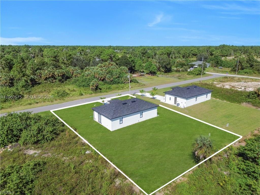 711 Roma Avenue Lehigh Acres, FL 33974 - Photo 31 of 38 a view of a tennis court