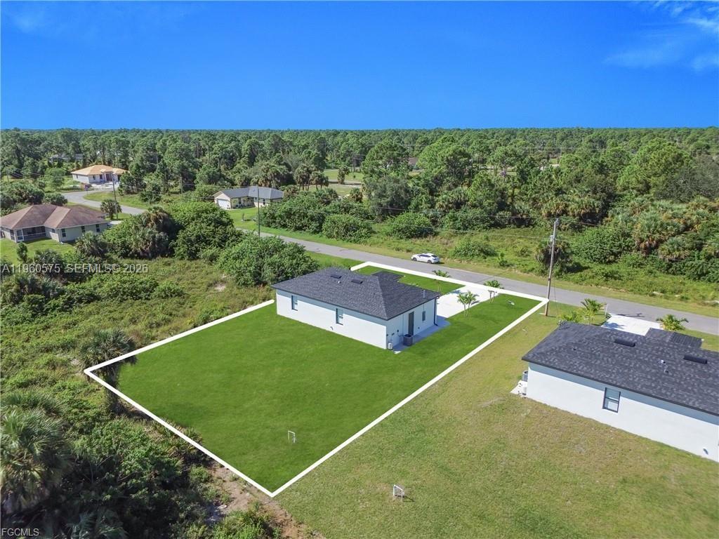 711 Roma Avenue Lehigh Acres, FL 33974 - Photo 33 of 38 a view of a tennis court