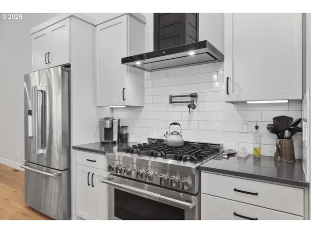 a view of a back yard from a living room