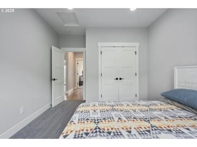 a bathroom with a toilet sink and shower