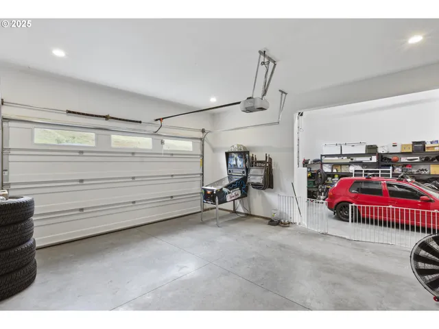 a room with lots of cars and other equipment