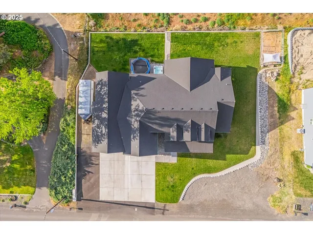 a view of a swimming pool with lounge chair