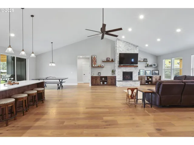 a view of a living room and kitchen