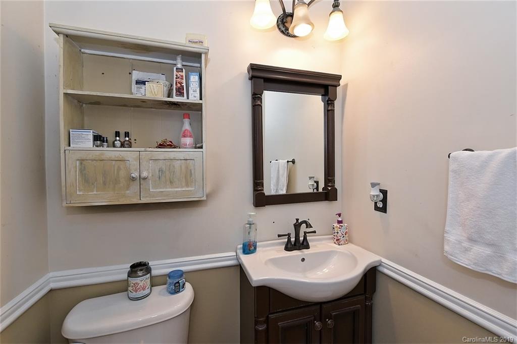 255 Choate Avenue Fort Mill, SC 29708 - Photo 20 of 38 a bathroom with a sink vanity and a mirror
