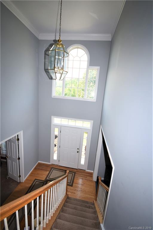 255 Choate Avenue Fort Mill, SC 29708 - Photo 3 of 38 a view of a hallway and wooden floor