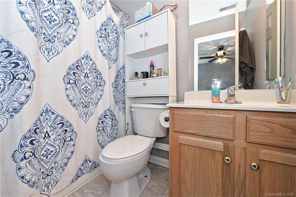 255 Choate Avenue Fort Mill, SC 29708 - Photo 24 of 38 a bathroom with a sink toilet and mirror