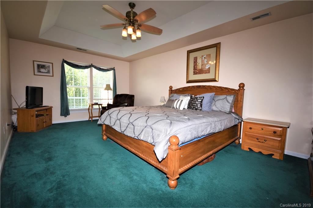 255 Choate Avenue Fort Mill, SC 29708 - Photo 25 of 38 a bedroom with a bed and a tv