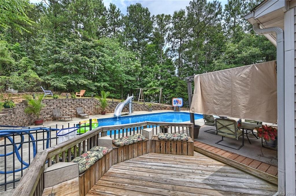 255 Choate Avenue Fort Mill, SC 29708 - Photo 29 of 38 a balcony with wooden floor and outdoor seating