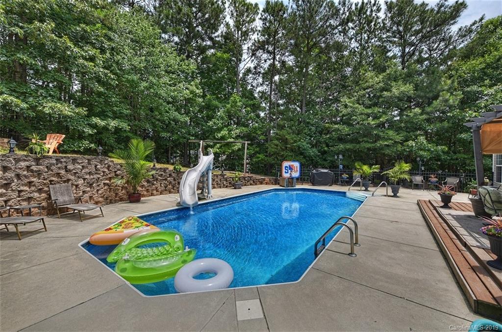 255 Choate Avenue Fort Mill, SC 29708 - Photo 33 of 38 a swimming pool with chairs