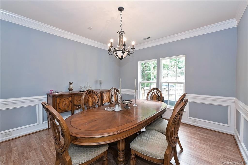 255 Choate Avenue Fort Mill, SC 29708 - Photo 6 of 38 a view of a dining room with furniture window and wooden floor