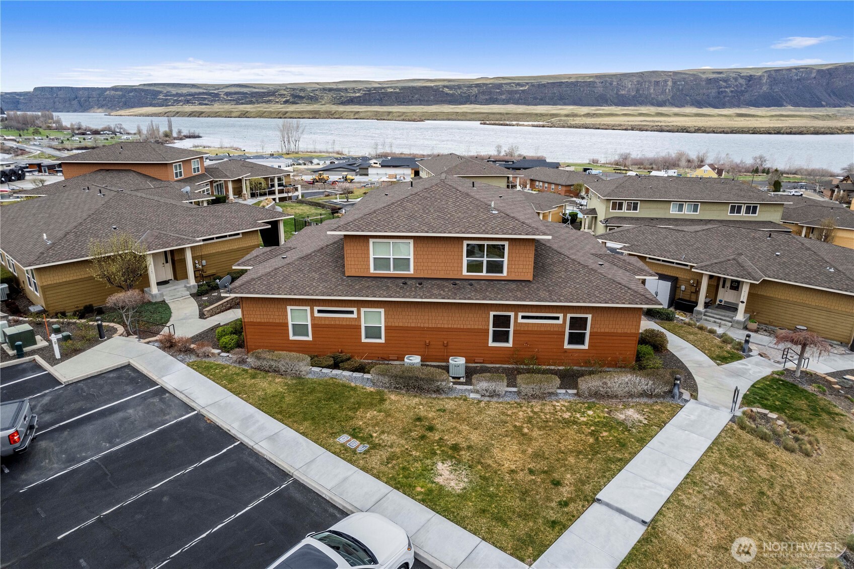 9122 Red Hawk Lane Northwest, Unit A76 Quincy, WA 98848 - Photo 1 of 40 a view of a city with an ocean