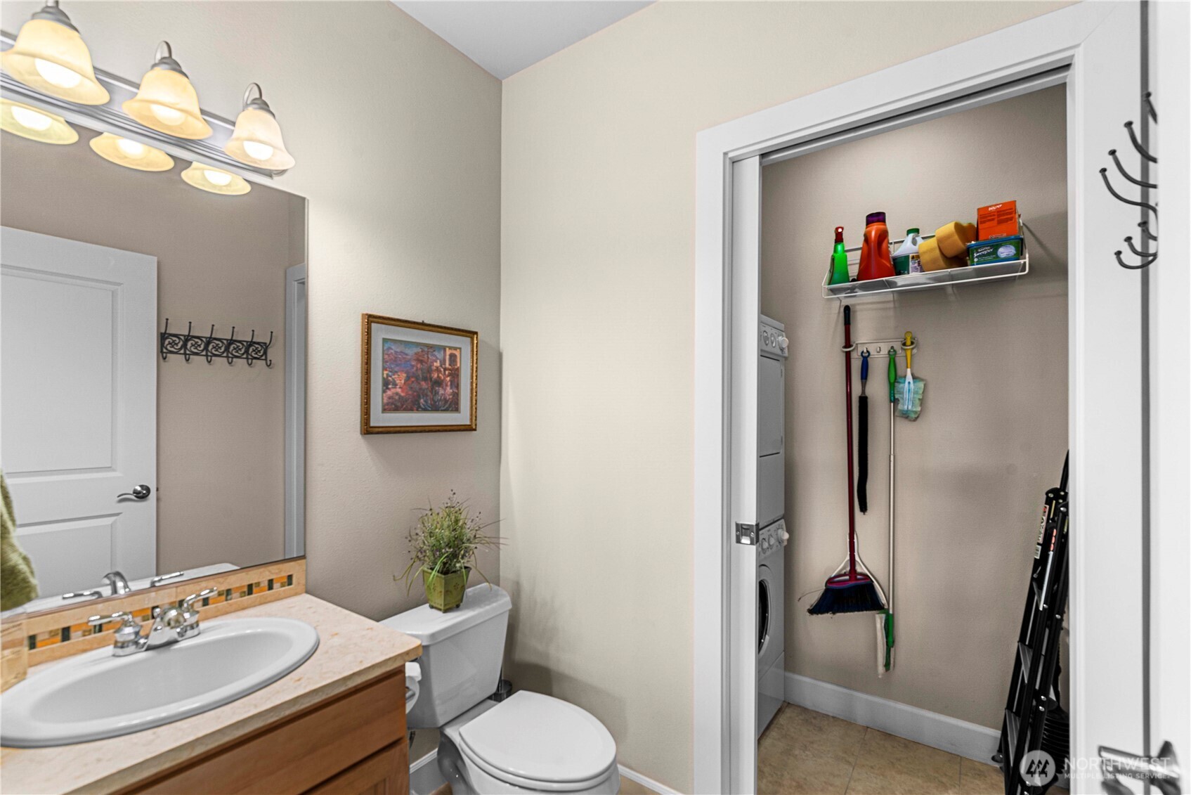 9122 Red Hawk Lane Northwest, Unit A76 Quincy, WA 98848 - Photo 15 of 40 a bathroom with a sink vanity and toilet