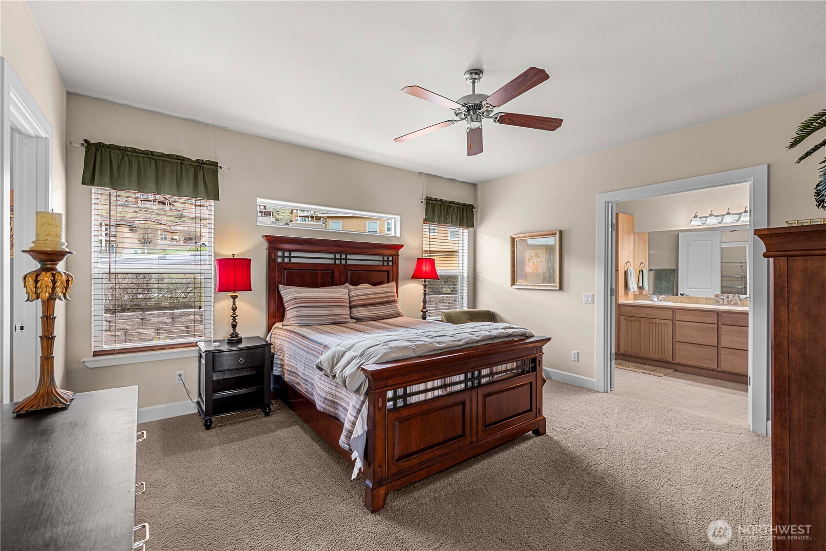 9122 Red Hawk Lane Northwest, Unit A76 Quincy, WA 98848 - Photo 17 of 40 a living room with a bed furniture and a window