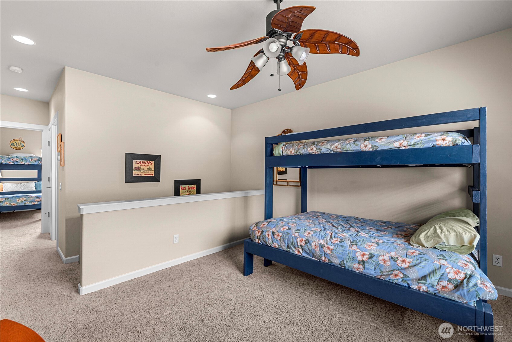 9122 Red Hawk Lane Northwest, Unit A76 Quincy, WA 98848 - Photo 26 of 40 a bedroom with a bed and a chandelier