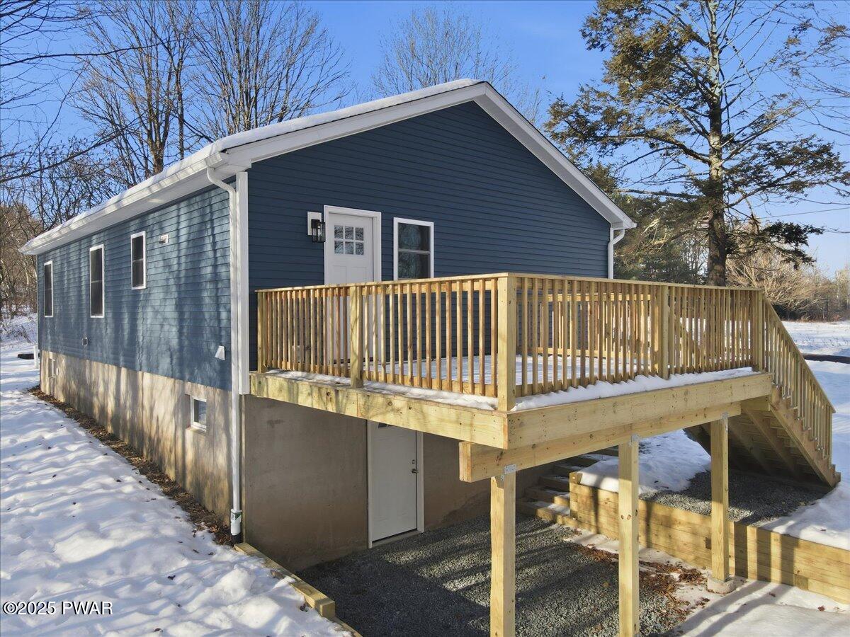 10 Swingle Road Moscow, PA 18444 - Photo 44 of 60 a view of a house with a wooden deck