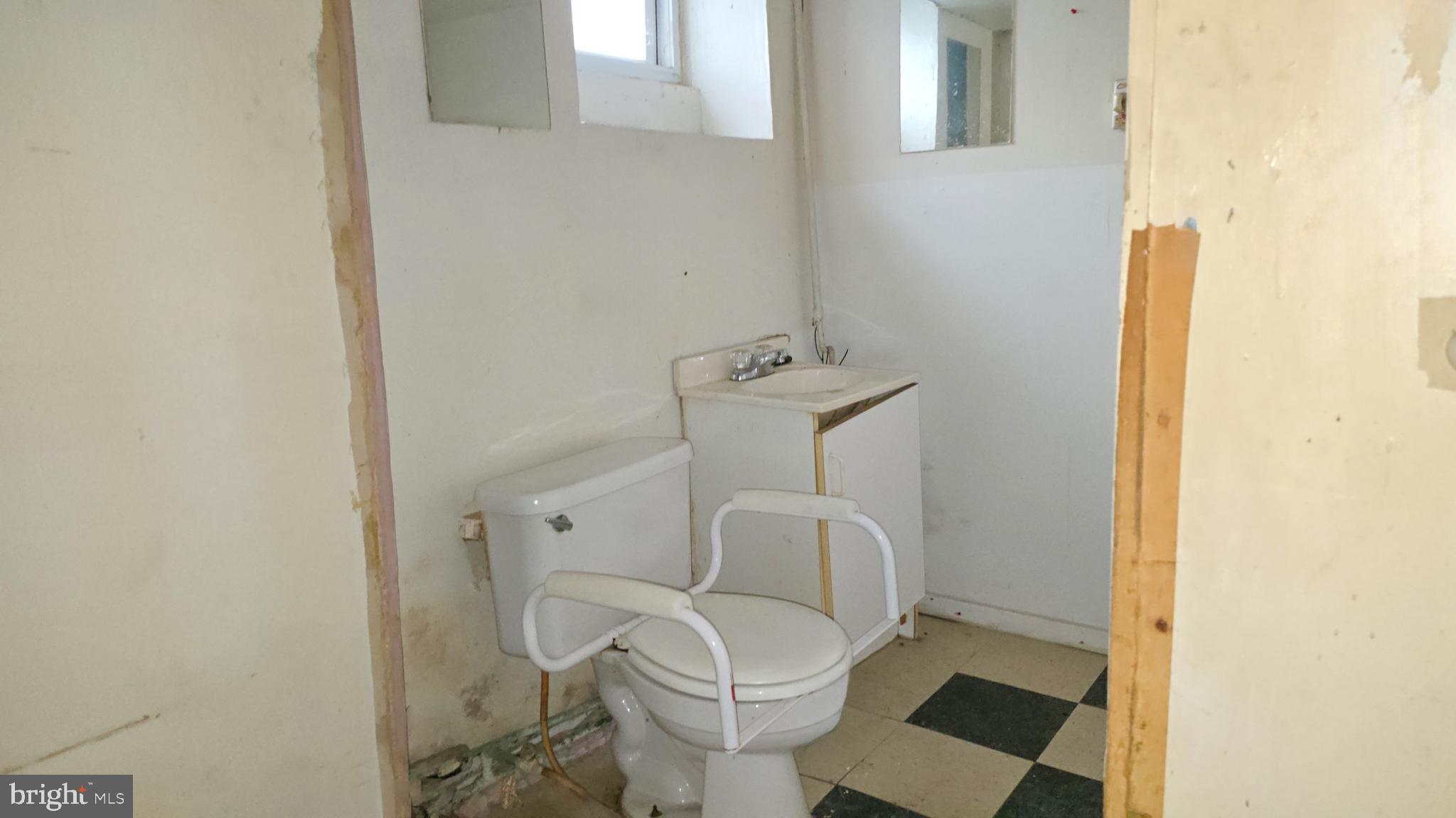 2308 Robb Street Baltimore, MD 21218 - Photo 23 of 23 Basement 1/2 bath