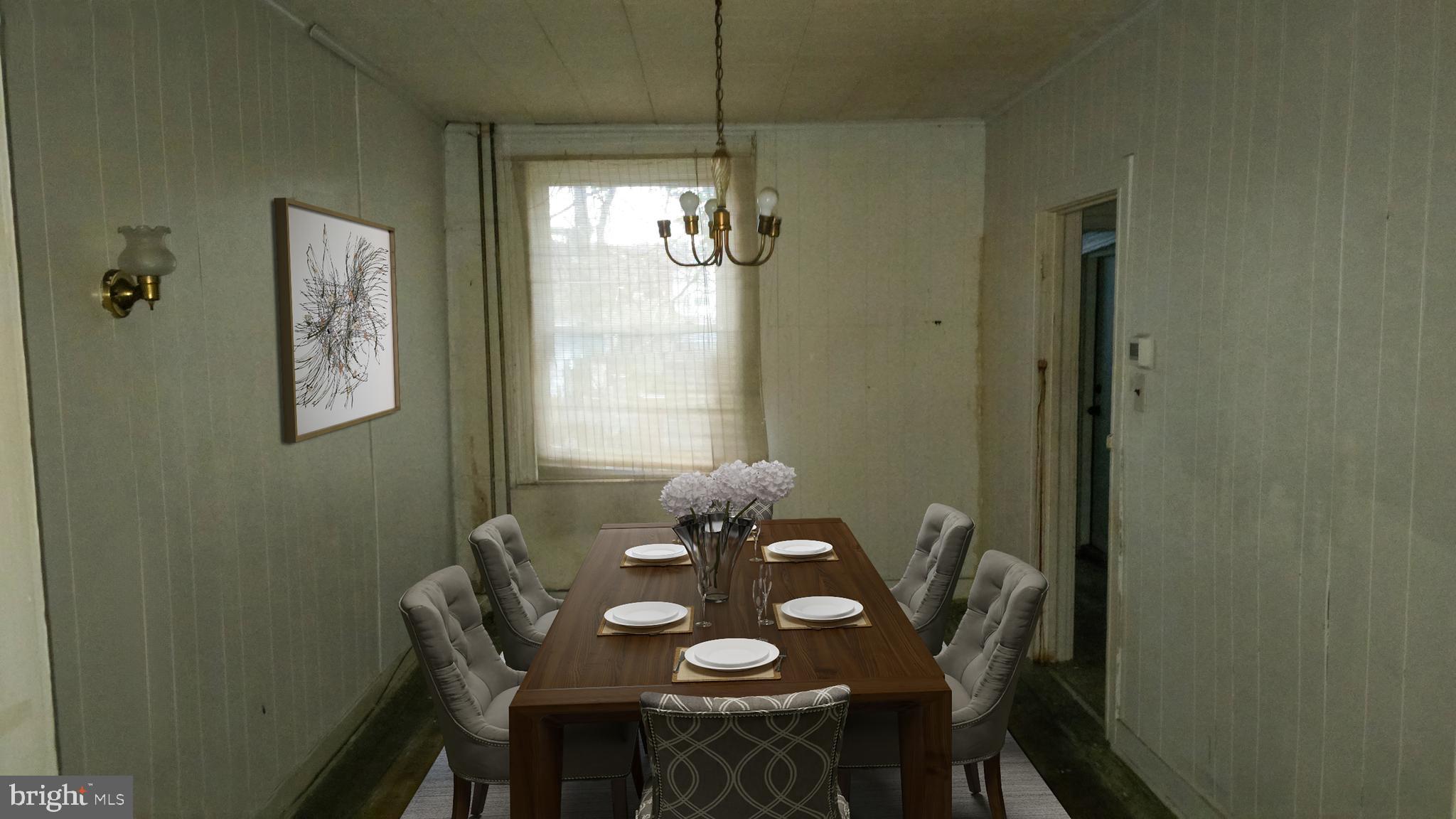 2308 Robb Street Baltimore, MD 21218 - Photo 4 of 23 Dining room staged