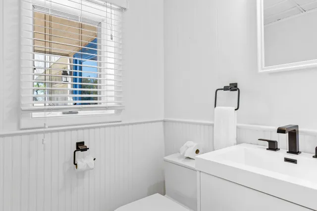 a bathroom with a sink and a vanity