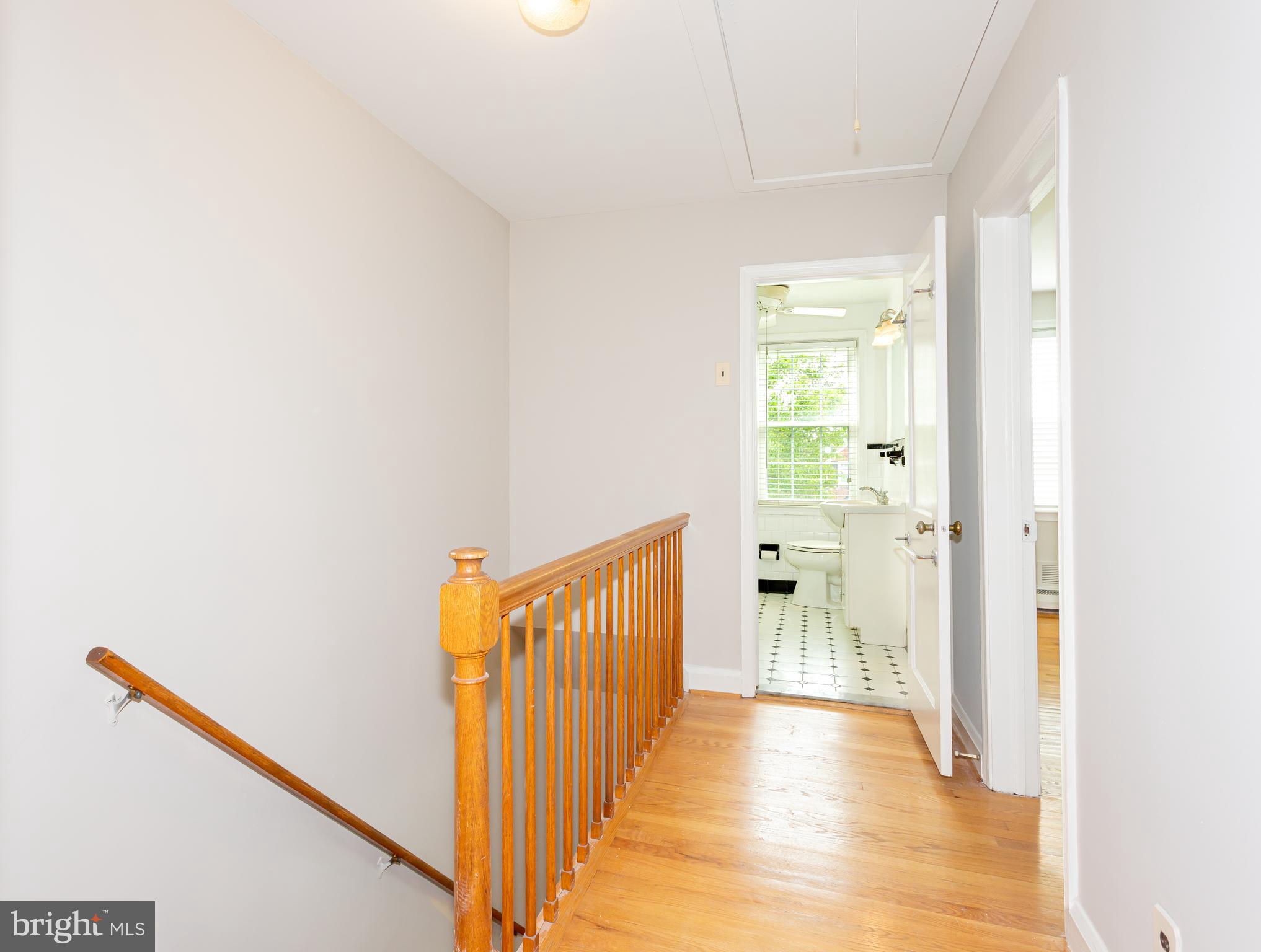 8426 Pleasant Plains Road Towson, MD 21286 - Photo 8 of 25 a view of a hallway with wooden floor