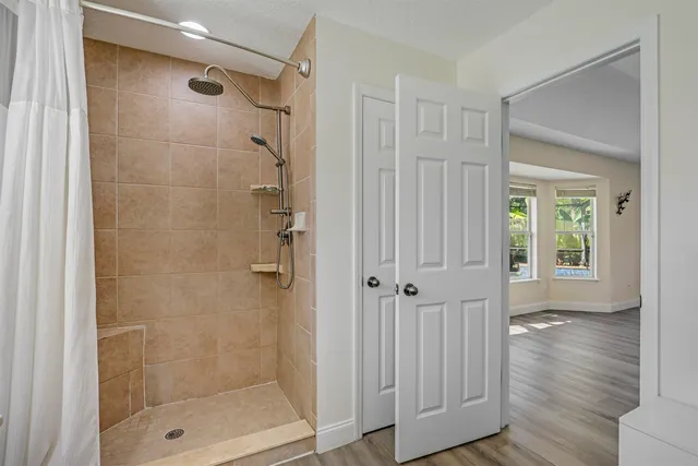 a view of storage and utility room with washer and dryer