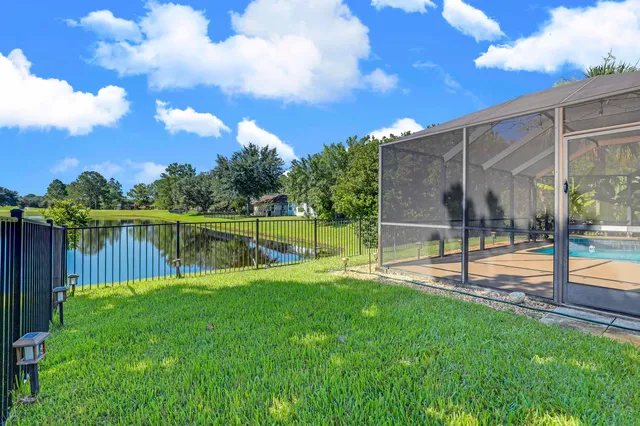 a view of room with window and furniture
